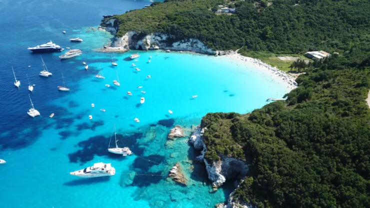 A turquoise bay with yachts and sailing boats